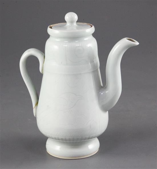 A Chinese pale celadon glazed wine pot and cover, probably Republic period, height 14.4cm, handle broken and restuck